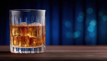 Elegant whiskey tumbler on dark table with soft lighting modern still life nighttime ambiance photo