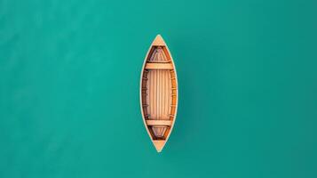 Aerial view of a small boat floating in turquoise water tropical paradise nature scene photo