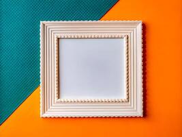 Elegant White Frame on Bold Teal and Orange Background. Modern Minimalist Design photo