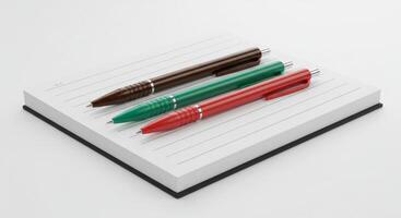 Colorful writing implements resting on lined page symbolizing creation photo