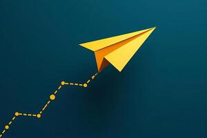 Conceptual image of yellow paper airplane symbolizing business growth and financial success on an abstract dark blue background. photo