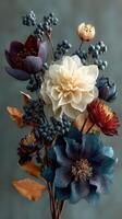 Beautiful arrangement of dried flowers with natural tones displayed against a textured background photo