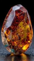 Glowing amber gemstone displays intricate bubbles and natural texture, beautifully lit against a dark surface photo
