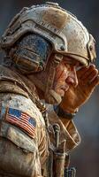 Soldier saluting with pride after a gritty mission in a challenging environment at dawn photo