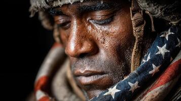 Soldier reflecting during a quiet moment after deployment in a tense situation in a remote location photo
