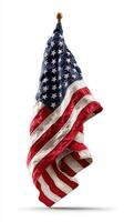 Vibrant American flag waving gracefully against a white background in a patriotic display photo