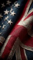 Close-up view of American and British flags blending together in a textured display of patriotism and history photo
