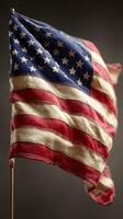 Waving American flag with vintage texture showcasing patriotism in a muted background setting photo