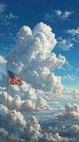 Majestic clouds surround an American flag waving proudly in the sky during a bright day at high altitude photo