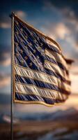Flag waving gracefully against a dramatic sky at sunset in a peaceful outdoor setting photo