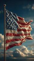 Waving American flag against a backdrop of dramatic clouds during the late afternoon sun photo