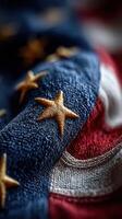 Detailed close-up of fabric showing intricate star embroidery and vibrant colors of an American flag representation photo