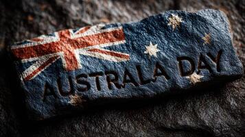 Celebrating Australia Day with an engraved stone featuring the national flag and festive message photo