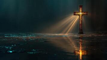 Glimmering cross illuminated by rays of light in a mysterious dark setting photo