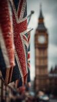 Union Jack flags fluttering in the rain with Big Ben in the background during a cloudy day in London photo