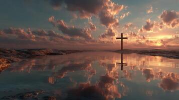 Sunset reflection with a cross over water in a serene landscape photo