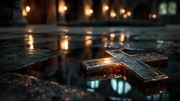 Reflection of a cross in a dimly lit, ancient chapel with flickering candlelight photo