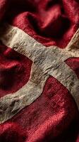 Detailed close-up of textured fabric with distinctive red and beige pattern showcasing craftsmanship photo