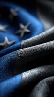 Flag representing unity and resilience with intricate details captured in soft lighting and textured fabric photo