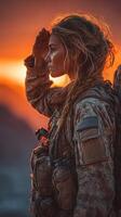 Soldier saluting at sunset in desert landscape demonstrating dedication and bravery photo