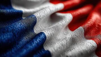 Close-up view of the French flag showcasing vibrant colors and silky texture during a cultural event photo