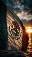 Mexican flag waves at sunset with vibrant colors over the ocean creating a striking visual atmosphere photo