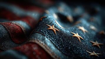 Textured close-up view of an American flag with rich colors and intricate stitching captured in soft lighting photo