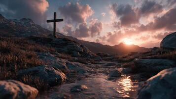 Sunset over rocky landscape with a cross and stream reflecting the golden light in a serene mountain setting photo