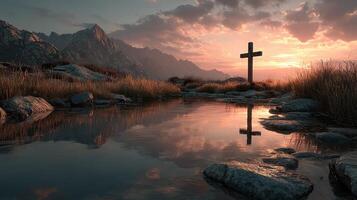 Serene sunset reflection on water with a cross near a mountain landscape photo