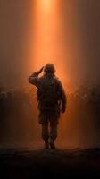 Soldier saluting in front of a crowd during a sunset ceremony honoring bravery and sacrifice photo
