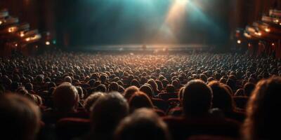 Audience enjoying a live performance in an ornate theater, the atmosphere filled with anticipation and excitement as the lights dim photo