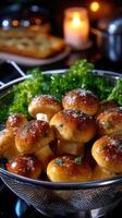 Gourmet mushrooms being prepared with fresh herbs and seasoning in a cozy kitchen setting during evening photo
