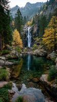 Majestic waterfall cascading into serene pool surrounded by autumn foliage in mountainous landscape photo