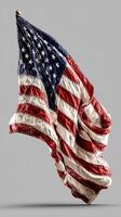 Waving American flag captured in mid-air with a textured surface and vibrant colors photo