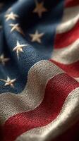 Waving fabric of the American flag showcasing stars and stripes in rich colors and textures photo