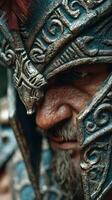 Intricate warrior helmet design highlights craftsmanship during historical reenactment in a forest setting photo