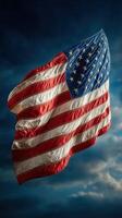 Waving American flag with vibrant colors against a dramatic cloudy sky photo
