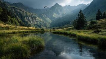 Gliding over a serene mountain landscape at the break of dawn in a lush valley surrounded by towering peaks photo