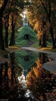 Colorful autumn landscape reflects in tranquil pond with historic structure surrounded by trees photo