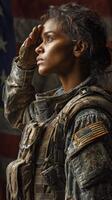 Soldier saluting with pride in front of an American flag during a military ceremony photo