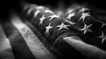 U.S. flag displayed with intricate stitching and stars, capturing an emblem of national pride in monochrome tones photo