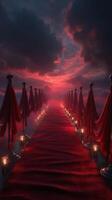 Path of red fabric and lanterns leads to a dramatic sunset photo