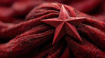Red fabric draped with a star emblem, symbolizing vintage influences and historical significance in a contemporary setting photo