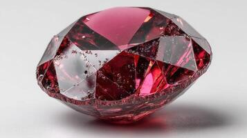 Stunning red gem showcases intricate facets reflecting light in a striking, colorful display of beauty and clarity photo
