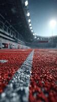 Rain-soaked athletic track with stadium lights illuminating a busy venue during a competition photo