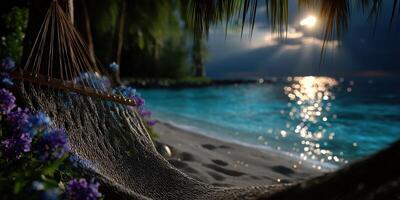 Hammock by the beach under a beautiful sunset with gentle waves and serene surroundings photo