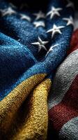 Flags of Ukraine and the United States interwoven, symbolizing unity and support during challenging times photo