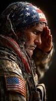 Soldier saluting in rain, adorned with American flag bandana during a somber moment of tribute photo