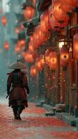 Traditional warrior walks through ancient street adorned with glowing lanterns during autumn evening photo