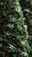 Festive greenery adorned with pinecones and lights for holiday decoration in a cozy indoor space photo